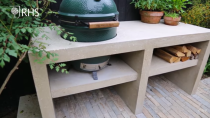 <p>'The worktop and storage unit are cast concrete, it was made in situ rather than dragging anything big and heavy through the house, but the colour works really well with the Purbeck stone,' explains Andy. 'It's important in a small garden not to mix too many materials because it can look like a right dog's dinner.'</p>