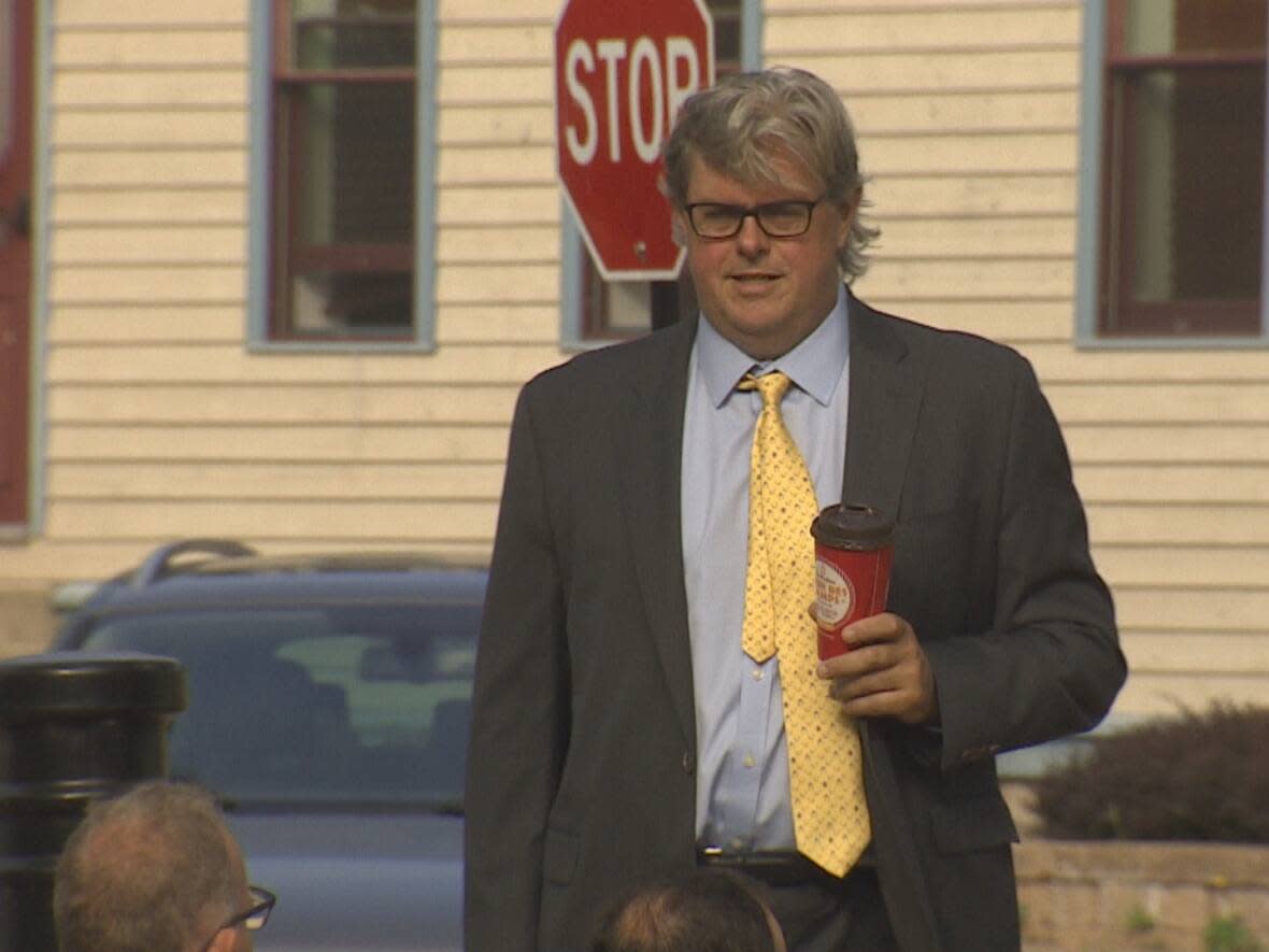 Paul Maines, shown arriving at court in Charlottetown in August 2020, is suing the Prince Edward Island government for breach of contract. (Ken Linton/CBC - image credit)