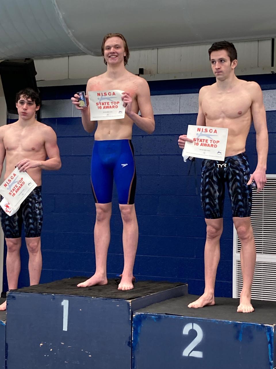 Kinnelon senior James Curreri (center) won the 200-yard individual medley at the NJSIAA Meet of Champions on March 6, 2022 at Gloucester County Institute of Technology in Sewell.