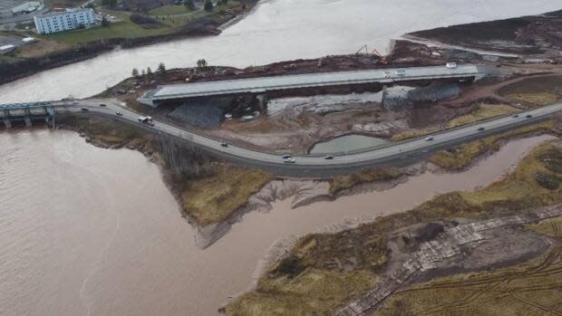 The causeway road, shown toward the bottom, will be removed during the closure and the river channel realigned to flow under the new bridge. 