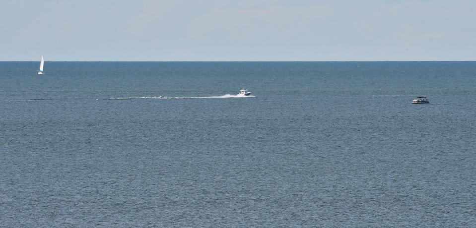 Boats share the waters of Lake Erie off east Erie in July. Lake levels are dropping but aren't forecast to reach anywhere near record lows.