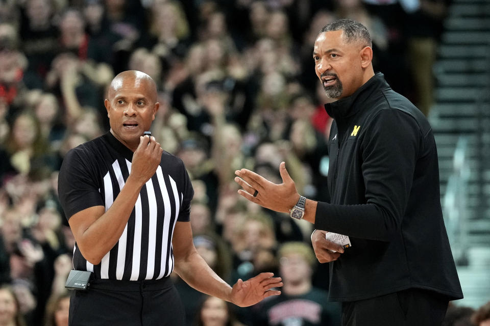 Feb 14, 2023; Madison, Wisconsin, USA; Michigan Wolverines head coach Juwan Howard talks with a referee during the second half against the Wisconsin Badgers at the Kohl Center. Mandatory Credit: Kayla Wolf-USA TODAY Sports