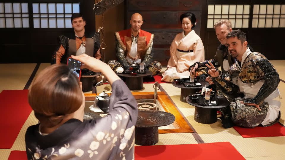 Visitors are taken out for a traditional kaiseki meal before they spend the night inside the castle. - Odawara Tourism Association