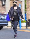 <p>Rebel Wilson stocks up on groceries with a reusable tote bag on Thursday in L.A. </p>