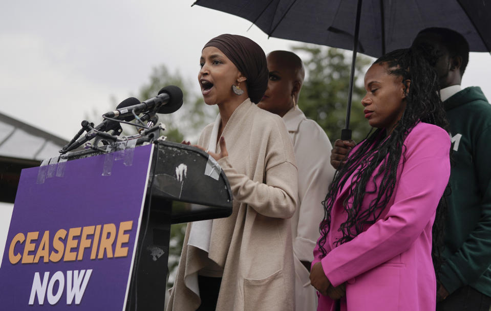 FILE - Rep. Ilhan Omar, D-Minn., left, talks during a press conference to call for a ceasefire in Israel and Gaza on Capitol Hill, Oct. 20, 2023, in Washington. (AP Photo/Mariam Zuhaib, File)