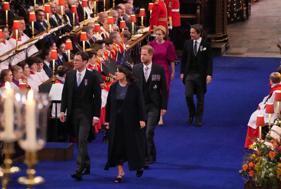 topshot princess eugenie and jack brooksbank front, britains prince harry, duke of sussex centre and princess beatrice and edoardo mapelli mozzi arrive at westminster abbey in central london on may 6, 2023, ahead of the coronations of britains king charles iii and britains camilla, queen consort the set piece coronation is the first in britain in 70 years, and only the second in history to be televised charles will be the 40th reigning monarch to be crowned at the central london church since king william i in 1066 outside the uk, he is also king of 14 other commonwealth countries, including australia, canada and new zealand camilla, his second wife, will be crowned queen alongside him, and be known as queen camilla after the ceremony photo by aaron chown pool afp photo by aaron chownpoolafp via getty images