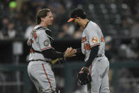 Baltimore Orioles closing pitcher Jorge Lopez right, celebrates with catcher Adley Rutschman after the Orioles defeated the Chicago White Sox 4-0 in a baseball game Thursday, June 23, 2022, in Chicago. (AP Photo/Paul Beaty)