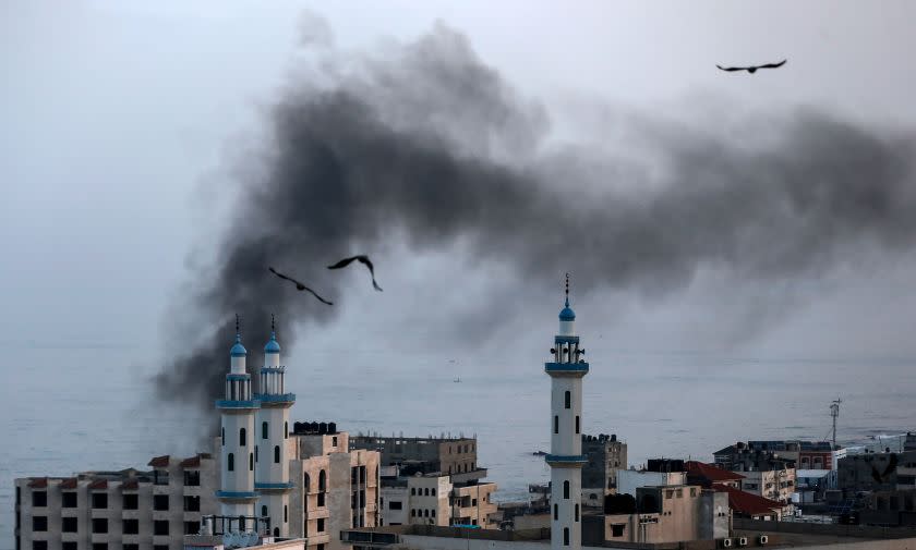 Smoke rises from a building in Gaza City after an Israeli airstrike on Wednesday.