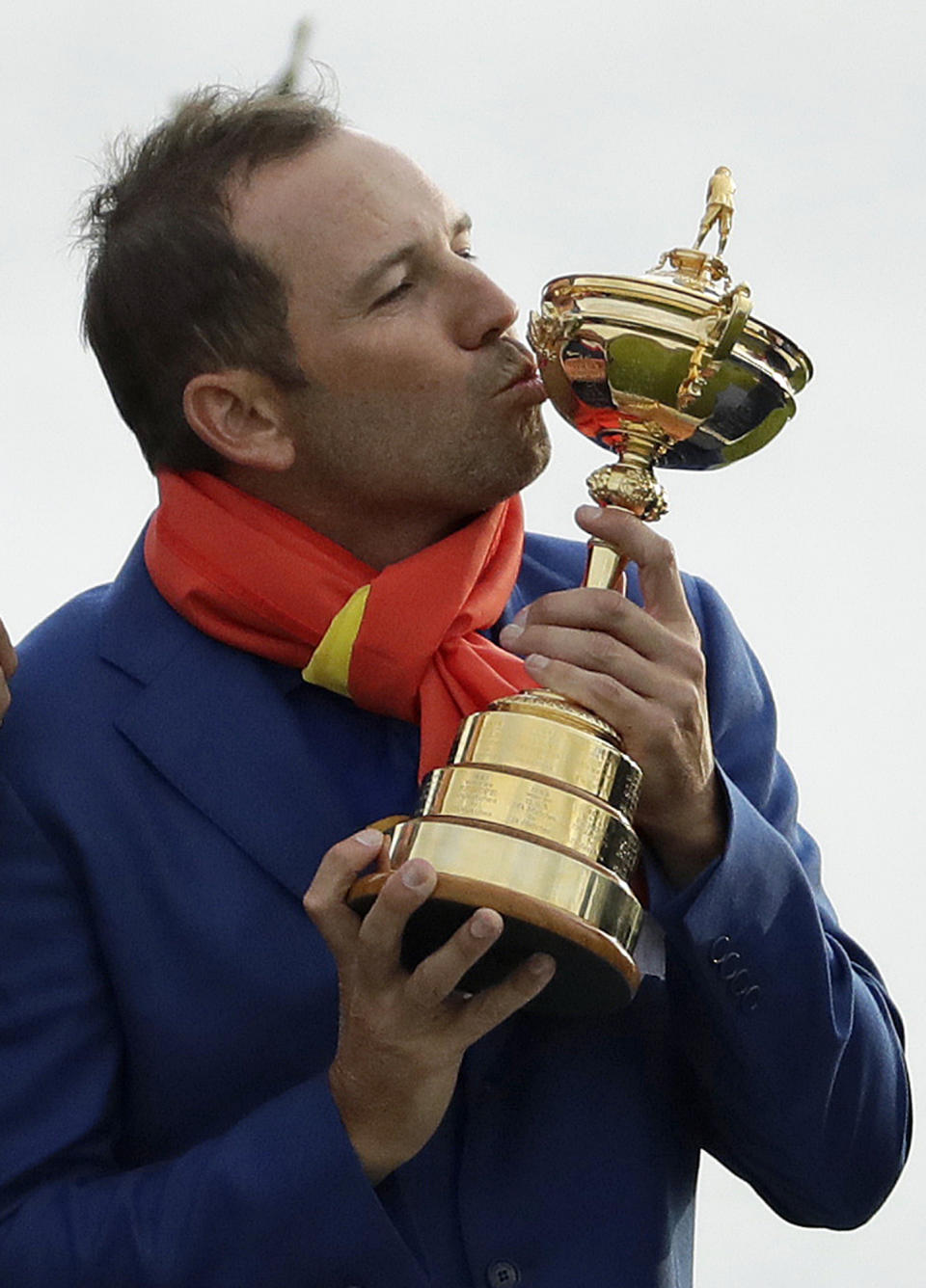 FILE - In this Sept. 30, 2018, file photo, Europe's Sergio Garcia kisses the trophy after Europe won the Ryder Cup on the final day of the 42nd Ryder Cup at Le Golf National in Saint-Quentin-en-Yvelines, outside Paris, France. Garcia has the highest points total in Ryder Cup history with 25 1/2 points. The pandemic-delayed 2020 Ryder Cup returns the United States next week at Whistling Straits along the Wisconsin shores of Lake Michigan. (AP Photo/Matt Dunham, File)