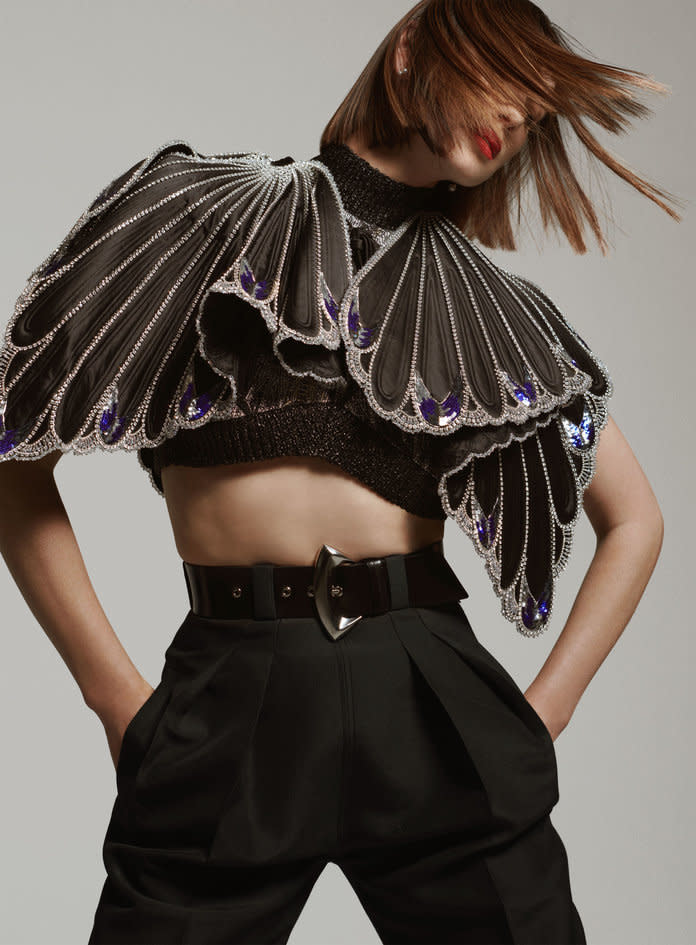 <p>Louis Vuitton cape, top, pants, and belt. Mizuki&nbsp;earrings. Photo by Philip Gay/2DM</p>