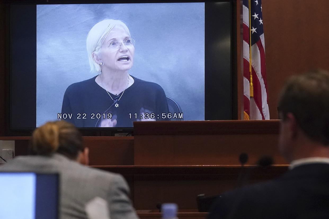 Actor Ellen Barkin testifies in a previously recorded video deposition at the Fairfax County Circuit Courthouse in Fairfax, Va., on Thursday.