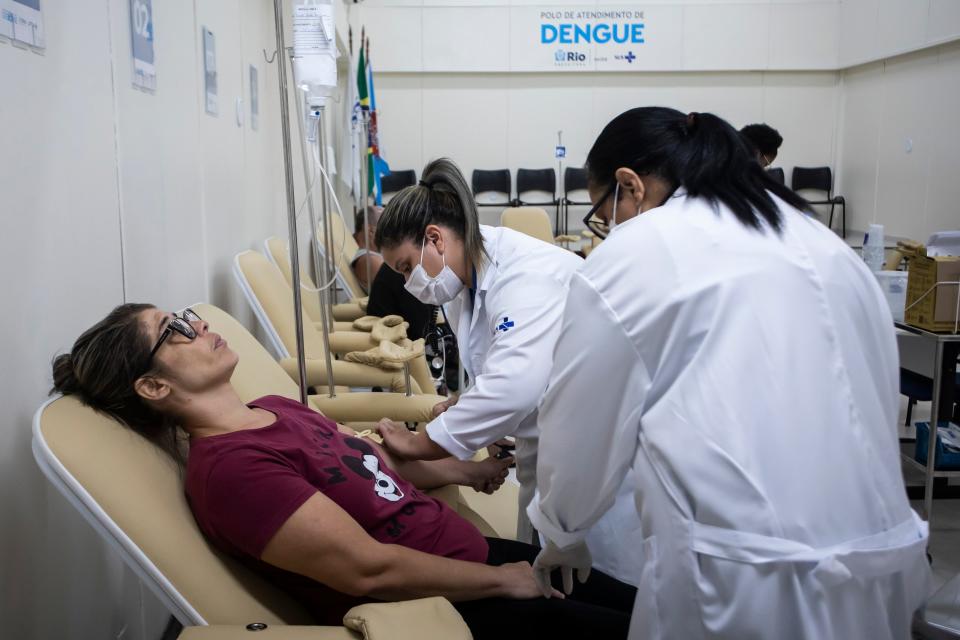 Renata Bastos is attended to at the dengue area of the Rodolpho Rocco Municipal Polyclinic in Rio de Janeiro, Brazil, Wednesday, Feb. 7, 2024. (AP Photo/Bruna Prado)
