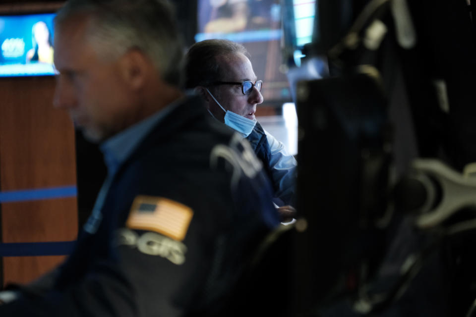 NEW YORK, NEW YORK - SEPTEMBER 30: Traders work on the floor of the New York Stock Exchange (NYSE) on September 30, 2021 in New York City. In afternoon trading the Dow was down over 250 points as investors continue to worry about inflation, wages and supply chain issues. (Photo by Spencer Platt/Getty Images)