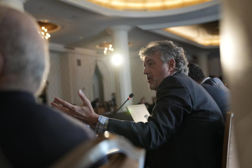 Scott Brennan participates in a Democratic National Committee rules and bylaws committee meeting in Washington on Dec. 2, 2022.  The committee is gathered for three days of meetings to vote on the order of presidential nominating calendar and the fate of Iowa's first in the nation caucuses. The DNC may potentially elevate states like Michigan ahead of Iowa, which has traditionally held the first caucus in the nation.