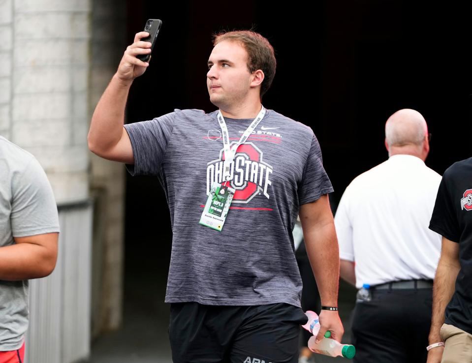 Ohio State Buckeye recruit OL Austin Siereveld (2023) takes in the atmosphere before the NCAA football game between Ohio State and Notre Dame.