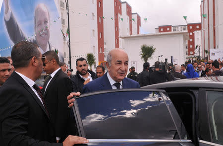 Algerian Housing minister Abdelmadjid Tebboune (C) is seen during the ceremony of social housing distribution in Algiers, Algeria April 3, 2017. Picture taken April 3, 2017. REUTERS/ Ramzi Boudina