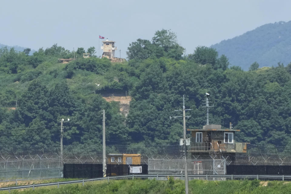 FILE - A North Korean military guard post, top, and South Korean post, bottom, are seen from Paju, South Korea, near the border with North Korea, Friday, May 31, 2024. South Korea has recently retaliated for North Korea's trash-carrying balloon launches with propaganda loudspeaker broadcasts at border areas. The South Korean broadcasts reportedly included K-pop sensation BTS’s mega hits like “Butter” and “Dynamite,” weather forecasts and news on Samsung as well as outside criticism on the North’s missile program. (AP Photo/Ahn Young-joon, File)