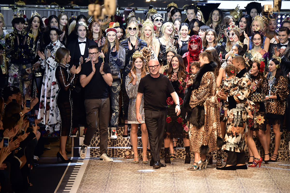 Domenico Dolce and Stefano Gabbana step on the runway.