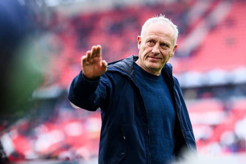 Freiburg coach Christian Streich stands in the stadium before the German Bundesliga soccer match between SC Freiburg and Eintracht Frankfurt at Europa-Park Stadium. Christian Streich is stepping down as Freiburg coach after more than 12 years in summer, marking the end of an era, the Bundesliga club said on Monday. Tom Weller/dpa