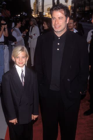 <p>Vinnie Zuffante/Getty</p> John Travolta with his son Jett in 1996.