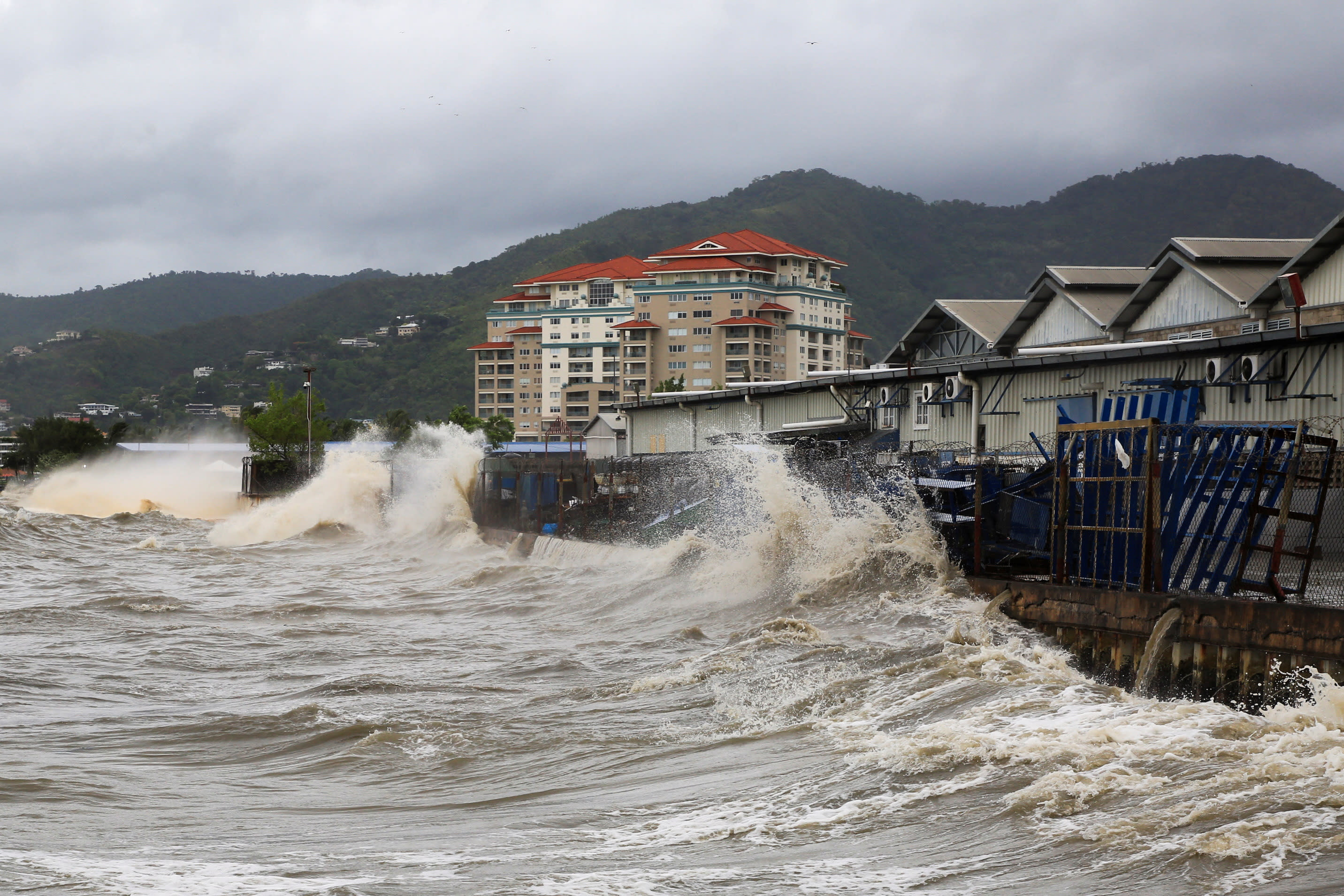 Waves crash into a seawall after Hurricane Beryl made landfall in Port of Spain, the capital of Trinidad and Tobago..