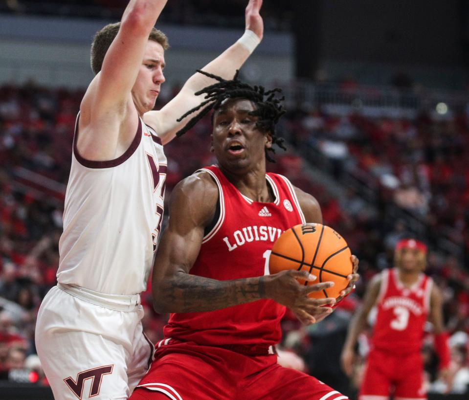 Louisville forward Mike James couldn't get past Virginia Tech guard Sean Pedulla as the Hokies defeated the Cards 71-54 Tuesday night at the KFC Yum Center. The Cards finished 4-26 overall, 2-17 in the ACC. Feb. 28, 2023