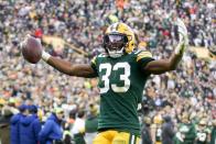 Green Bay Packers' Aaron Jones reacts after his first down run during the second half of an NFL football game against the Washington Redskins Sunday, Dec. 8, 2019, in Green Bay, Wis. (AP Photo/Morry Gash)