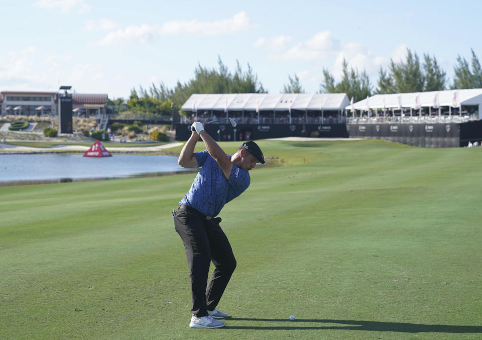 Bryson DeChambeau, of the United States, swings at a ball on the 18th hole fairway during the second round of the Hero World Challenge PGA Tour at the Albany Golf Club, in New Providence, Bahamas, Friday, Dec. 3, 2021.(AP Photo/Fernando Llano)