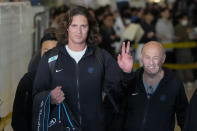 CORRECTS DATE - Los Angeles Dodgers pitcher Tyler Glasnow gestures toward photographers during the baseball team's arrival at Incheon International Airport, Friday, March 15, 2024, in Incheon, South Korea, ahead of the team's baseball series against the San Diego Padres. (AP Photo/Lee Jin-man)
