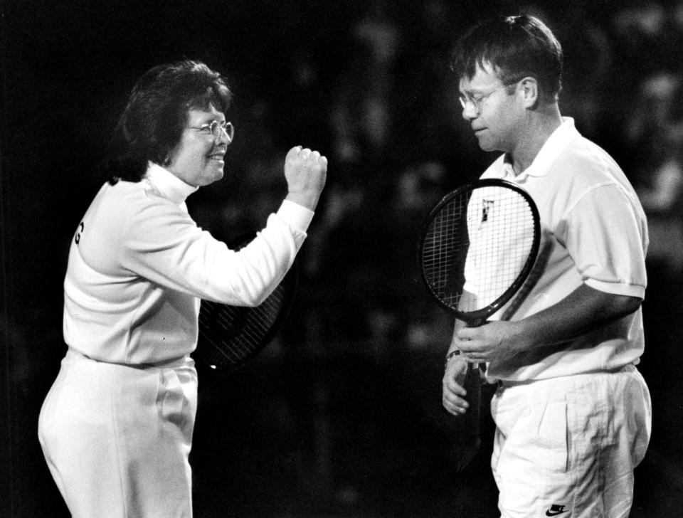 Billie Jean King and Elton John during their World Team Tennis match at Longwood Cricket Club in Brookline, Mass. ( Lane Turner/The Boston Globe via Getty Images)