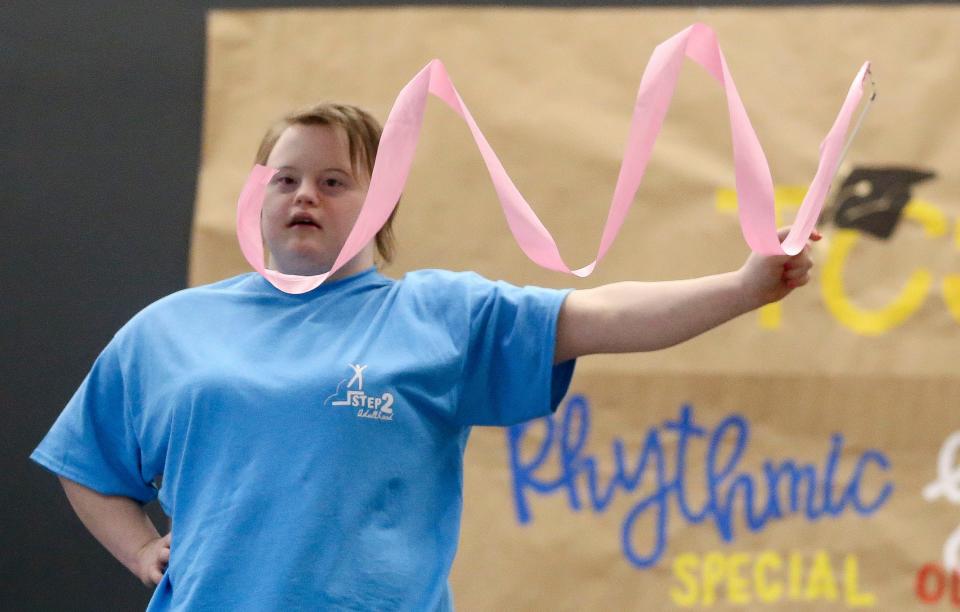 Haley Rodriguez, from Step 2, performs with the ribbon during the Tuscaloosa County School System’s Rhythmic Gymnastics Special Olympics event at Sipsey Valley Middle School Friday. The top three finishers in each event qualified for the state Special Olympic Games in May.