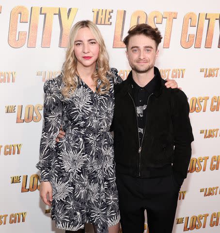 <p>Jamie McCarthy/Getty</p> Erin Darke and Daniel Radcliffe attend a screening of "The Lost City" at the Whitby Hotel on March 14, 2022 in New York City