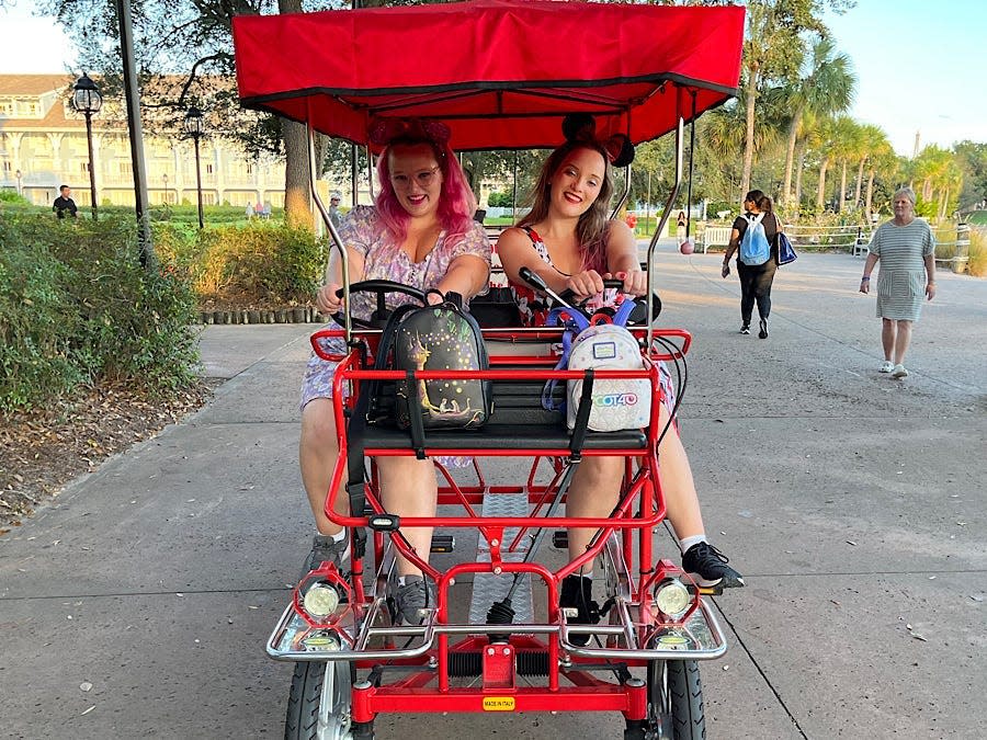 Author and her sister on the red surrey bike.