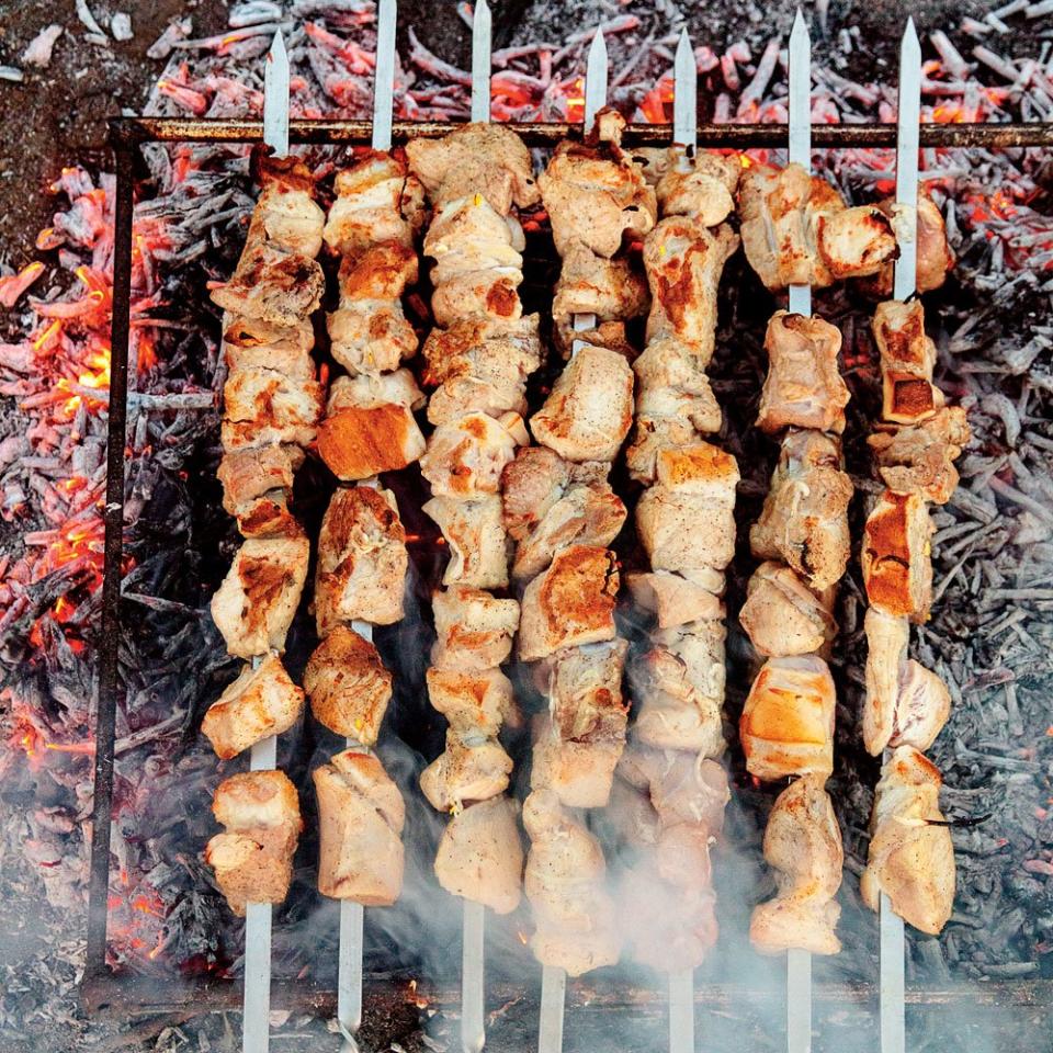 Mtsvadi (Grilled Pork Skewers with Pomegranate and Onions)