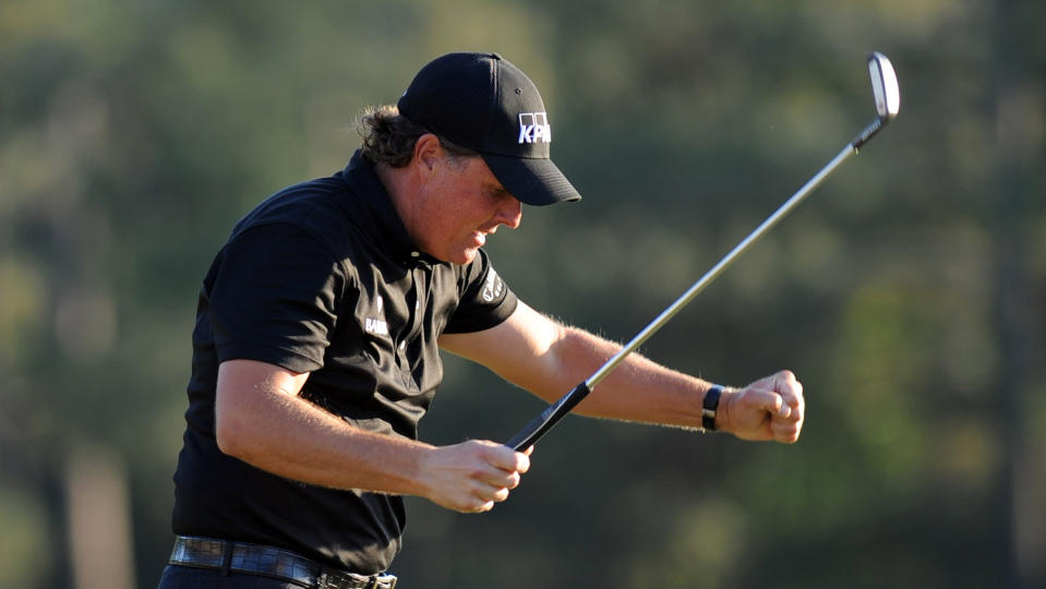 Phil Mickelson celebrates winning the 2010 Masters at Augusta National