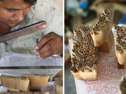 workers creating a mold for jewelry from a sketc