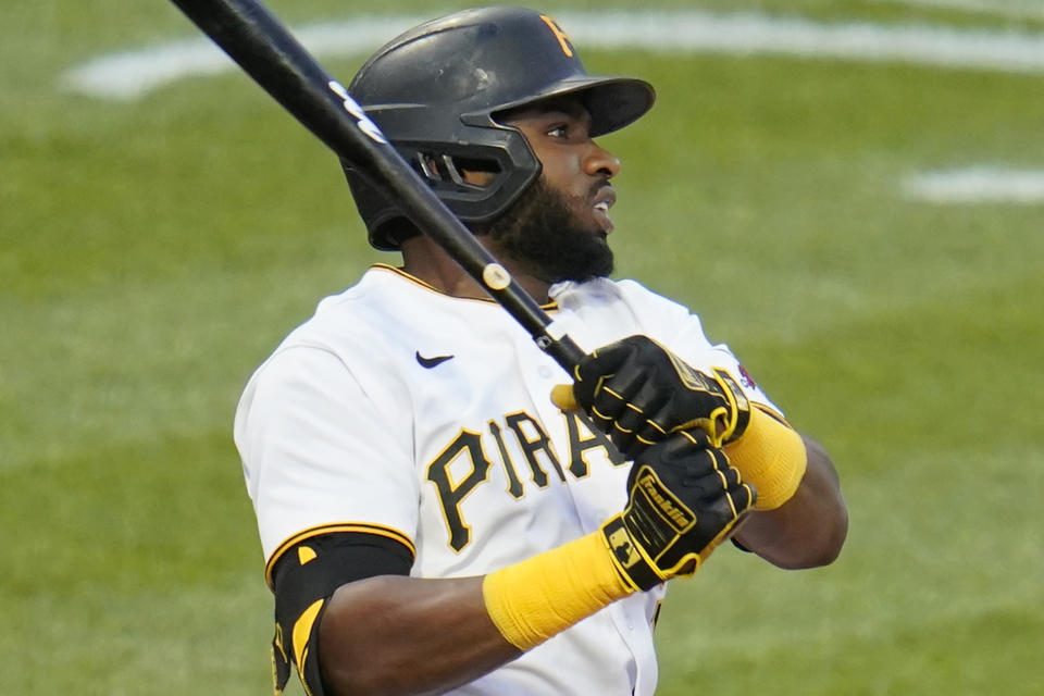 Pittsburgh Pirates' Gregory Polanco singles off Philadelphia Phillies starting pitcher Vince Velasquez, driving in a run, during the second inning of a baseball game in Pittsburgh, Friday, July 30, 2021. (AP Photo/Gene J. Puskar)