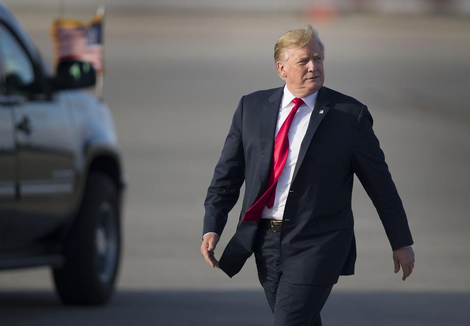 President Donald Trump walks to speak with supporters after arriving on Air Force One at the Palm Beach International Airport to spend Easter weekend at his Mar-a-Lago resort on April 18, 2019 in West Palm Beach, Florida. President Trump arrived as the report from special counsel Robert S. Mueller III was released by Attorney General William P. Bar earlier  in Washington, D.C.