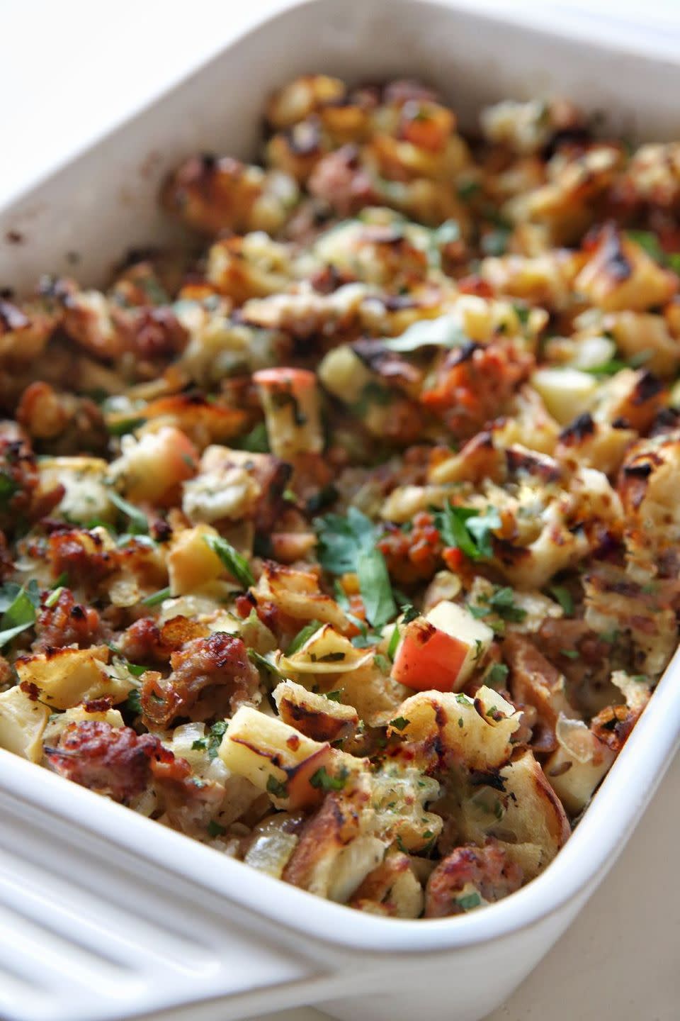 <p>Apples lend sweetness to this herb-flecked stuffing made with chewy focaccia bread.</p><p>Get the <a href="https://www.delish.com/uk/cooking/recipes/a28926334/apple-sausage-focaccia-stuffing-recipe/" rel="nofollow noopener" target="_blank" data-ylk="slk:Apple & Sausage Focaccia Stuffing;elm:context_link;itc:0;sec:content-canvas" class="link ">Apple & Sausage Focaccia Stuffing</a> recipe.</p>