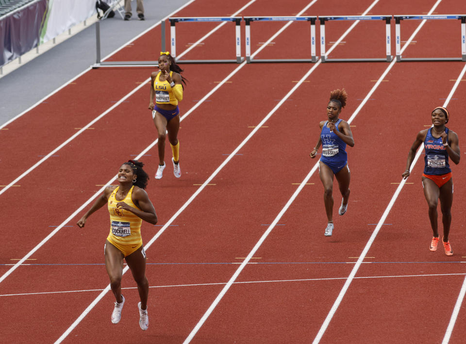 Southern California's Anna Cockrell wins the women's 400 hurdles during the NCAA Division I Outdoor Track and Field Championships, Saturday, June 12, 2021, at Hayward Field in Eugene, Ore. (AP Photo/Thomas Boyd)