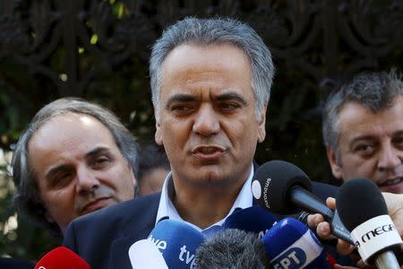 Newly appointed Energy Minister Panos Skourletis addresses the media before a swearing in ceremony at the Presidential Palace in Athens, Greece, July 18, 2015. REUTERS/Yiannis Kourtoglou