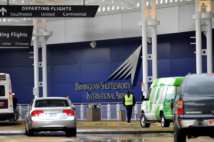 A flight information sign at the newly renovated Birmingham-Shuttlesworth International Airport in Birmingham, Ala., fell on a mother and her three children Friday afternoon, March 22, 2013, killing one child and injuring the mother and her two other children. (AP Photo/Tamika Moore, AL.com) MAGS OUT