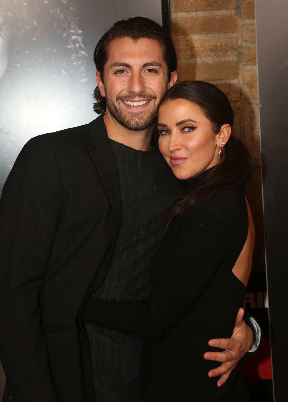Jason Tartick and Kaitlyn Bristowe and pose at the 25th Anniversary of "Chicago" on Broadway at The Ambassador Theater on November 16, 2021 in New York City