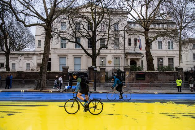 The group created the flag using washable paint poured onto the road and then driven through by passing vehicles