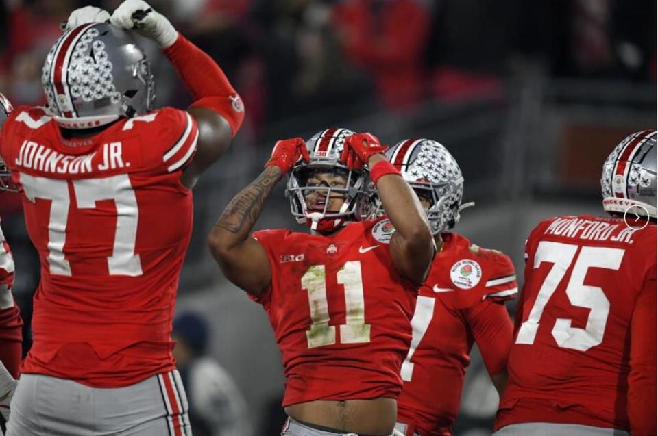 Wide receiver Jaxon Smith-Njigba (11), here celebrating at Ohio State’s Rose Bowl two seasons ago when he had 15 catches for 347 yards and three touchdowns. The Seahawks made him the 20th pick in the 2023 NFL draft on April 27, 2023.