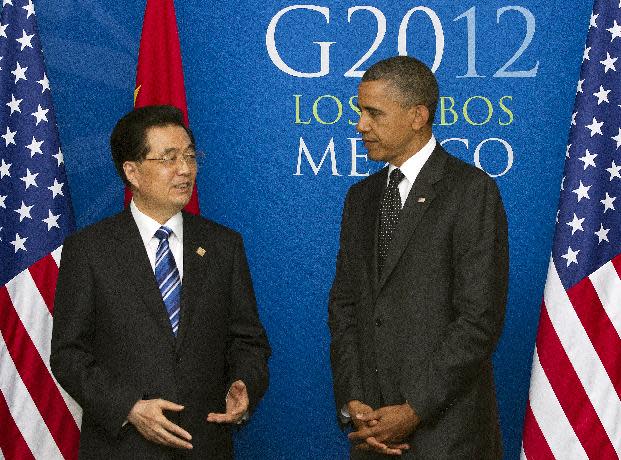 China’s President Hu Jintao speaks as President Barack Obama listens during a bilateral meeting during the G20 Summit, Tuesday, June 19, 2012, in Los Cabos, Mexico. (AP Photo/Carolyn Kaster)