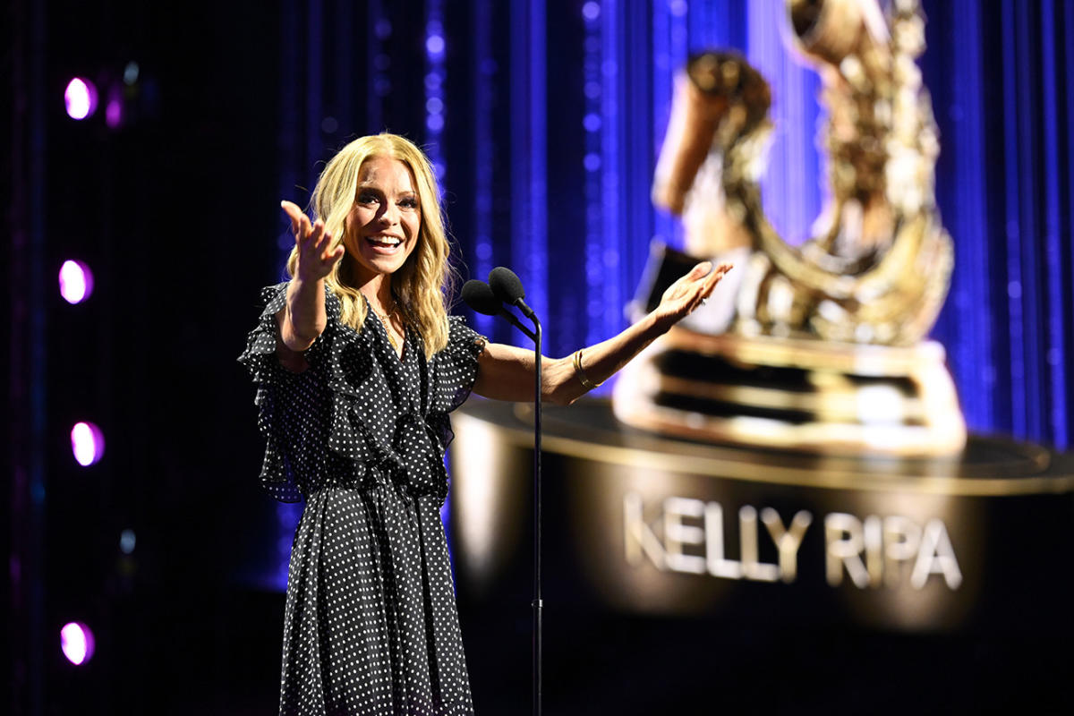 Kelly Ripa combines playful ruffles with classic polka dots in a Michael Kors dress for the Disney Legends Awards at the D23 fan event