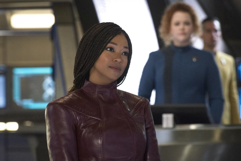 Burnham takes to the captain’s seat like the pro she is — and has a stylish new away-mission uniform! Is that pleather? - Credit: CBS