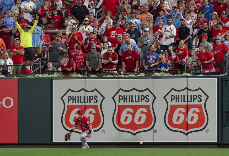 Los Angeles Angels right fielder Kole Calhoun plays a fly ball off the wall during the eighth inning of a baseball game against the St. Louis Cardinals, Sunday, June 23, 2019, in St. Louis. (AP Photo/L.G. Patterson)