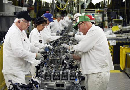 Anna Engine Plant associates are working on the engine assembly line in Anna, Ohio in this October 11, 2012 file photo taken during a tour of the Honda automotive engine plant. REUTERS/Paul Vernon/Files